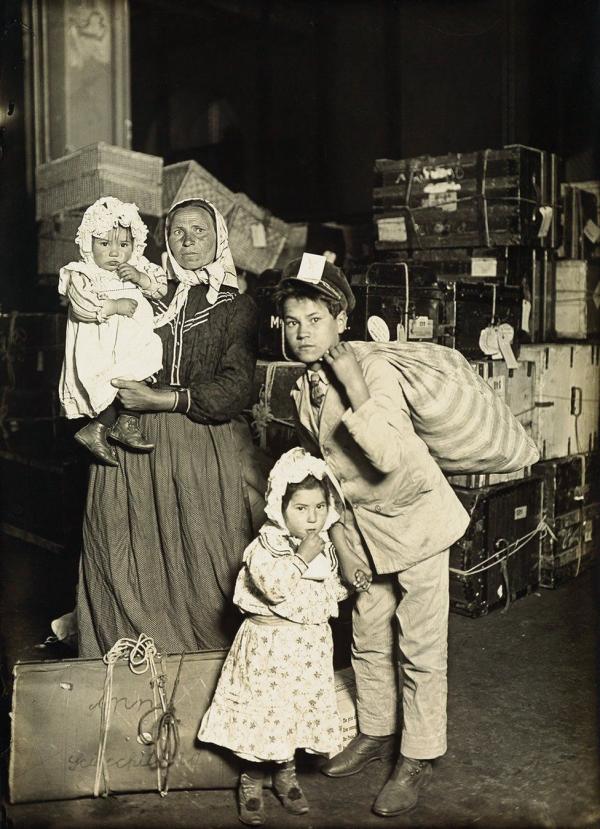  An Italian family arriving to 'the land of the free' at Ellis Island in 1905]