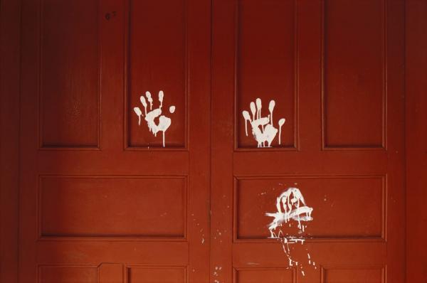  Arcatao, Chalatenango province. 1980. Mano Blanca, the signature of the death squads left on the door of a slain peasant organizer credit to Susan Meiselas, Magnum Photos