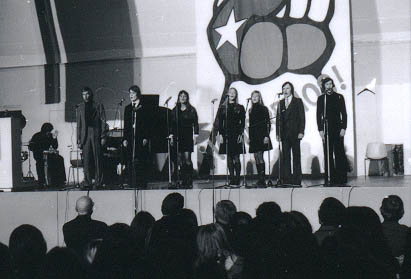 Chile solidarity concert in Helsinki in January 1974. On the stage the KOM Theatre Choir. Bald-headed President Kekkonen sitting in the first row left.