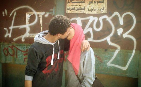 Two-young-lovers-kiss-on-the-street-in-Egypt