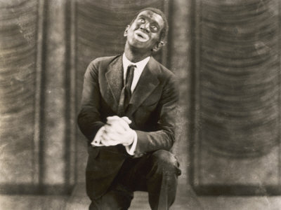 Al Jolson con la faccia dipinta di nero nel Cantante di jazz.