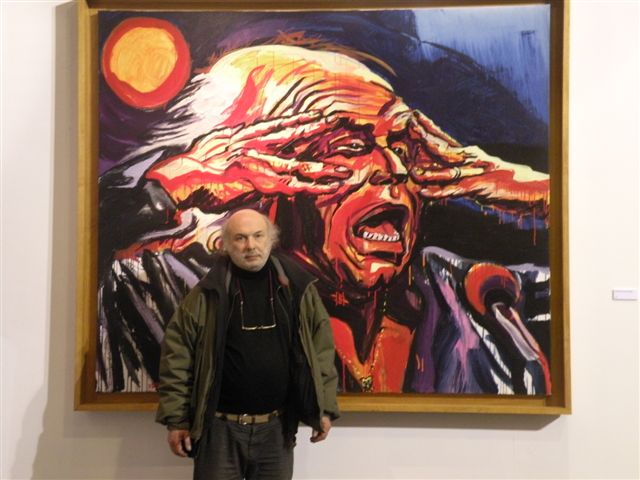 Le peintre Charles Szymkowicz, ami de Léo Ferré et de Marco Valdo M.I., avec son merveilleux portrait de Léo. Une espèce de "Cri" d'Edvard Munch, mais ce n'est pas le sombre cri de la peur, mais le cri solaire de la liberté et de la révolte.