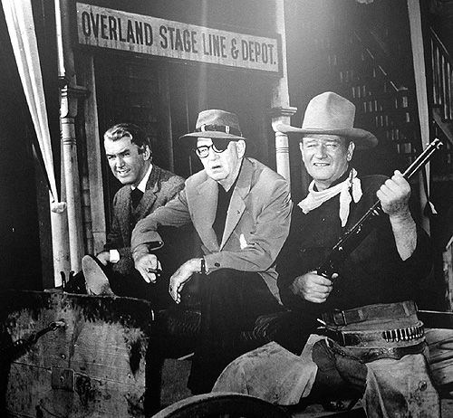 James Stewart, John Ford ‎e John Wayne sul set di “The Man Who Shot Liberty Valance”, 1962