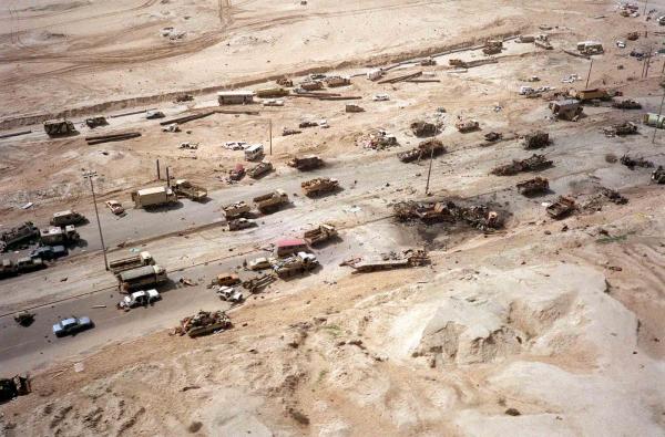  Civilian and Iraqi military vehicles litter a section of the highway attacked by Allied aircraft during Operation Desert Storm