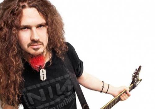 Listen closely to Nickelback's Dimebag Darrell tribute, Side Of A